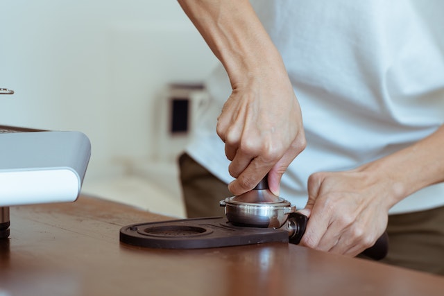 Tamping Coffee Grounds